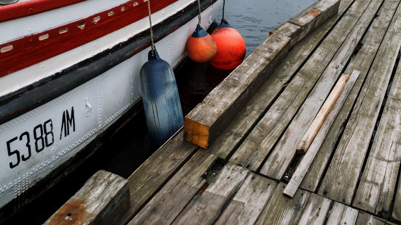Dock detail with boat fenders